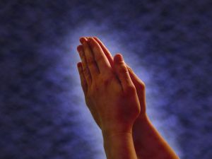 hands in praying position